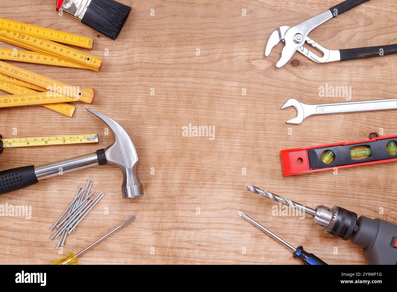 Assorted work tools on wood Stock Photo