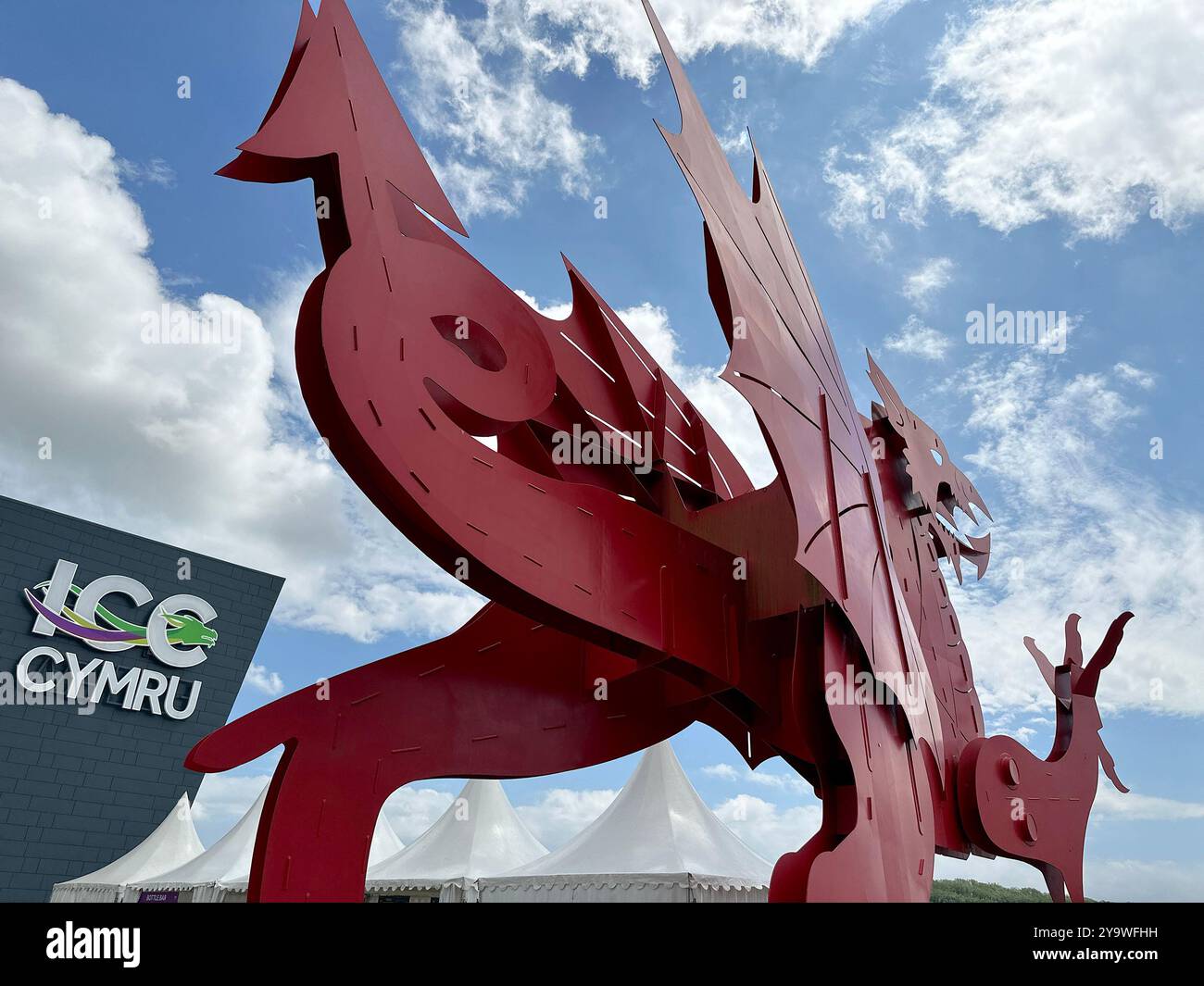 Newport, Wales, UK - 21 June 2024: Large red dragon public artwork outside the International Convention Centre at the Celtic Manor Resort - Smartphone Captured Stock Image