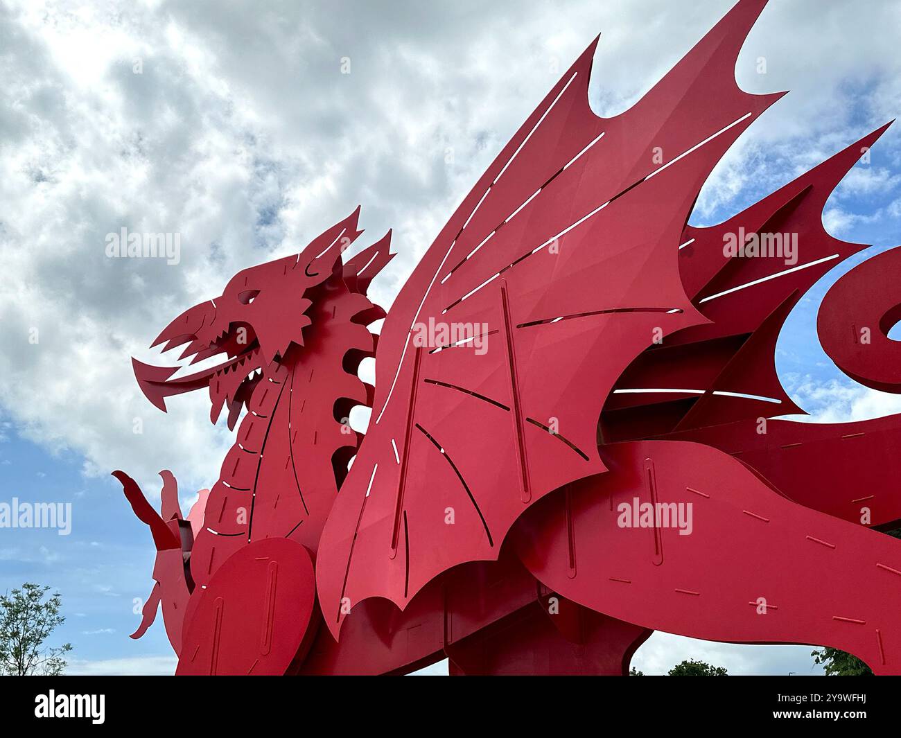 Newport, Wales, UK - 21 June 2024: Red dragon public artwork outside the International Convention Centre at the Celtic Manor Resort in south Wales - Smartphone Captured Stock Image