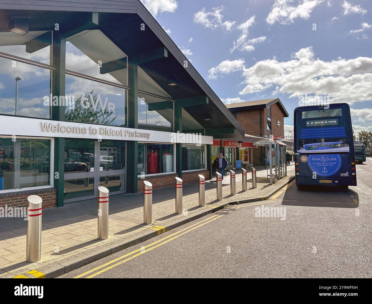 Didcot, England, UK - 4 July 2024: Public service bus at a bus stop outside Didcot Parkway railway station - Smartphone Captured Stock Image