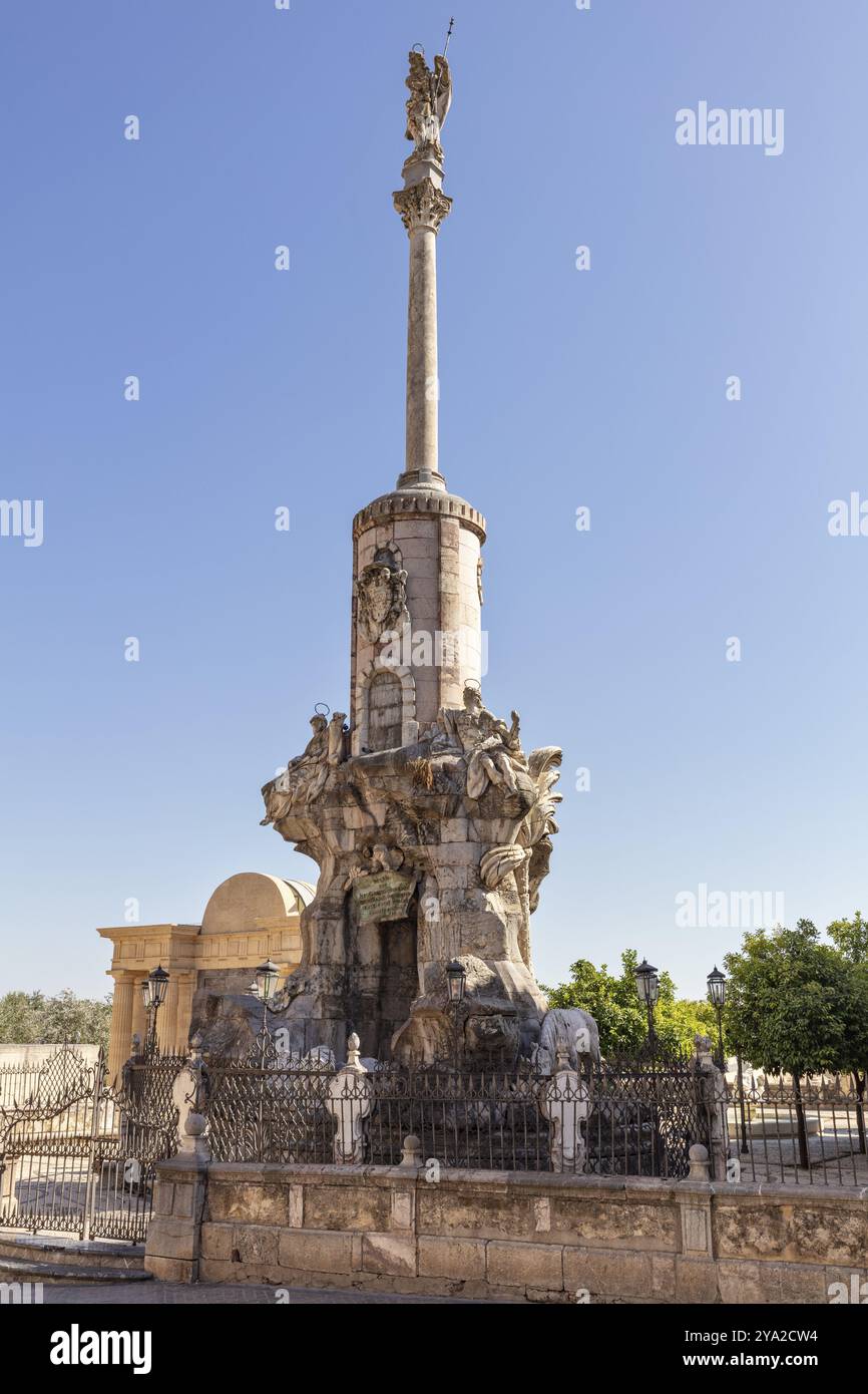 Imposing stone monument in a square with a historic column and ...