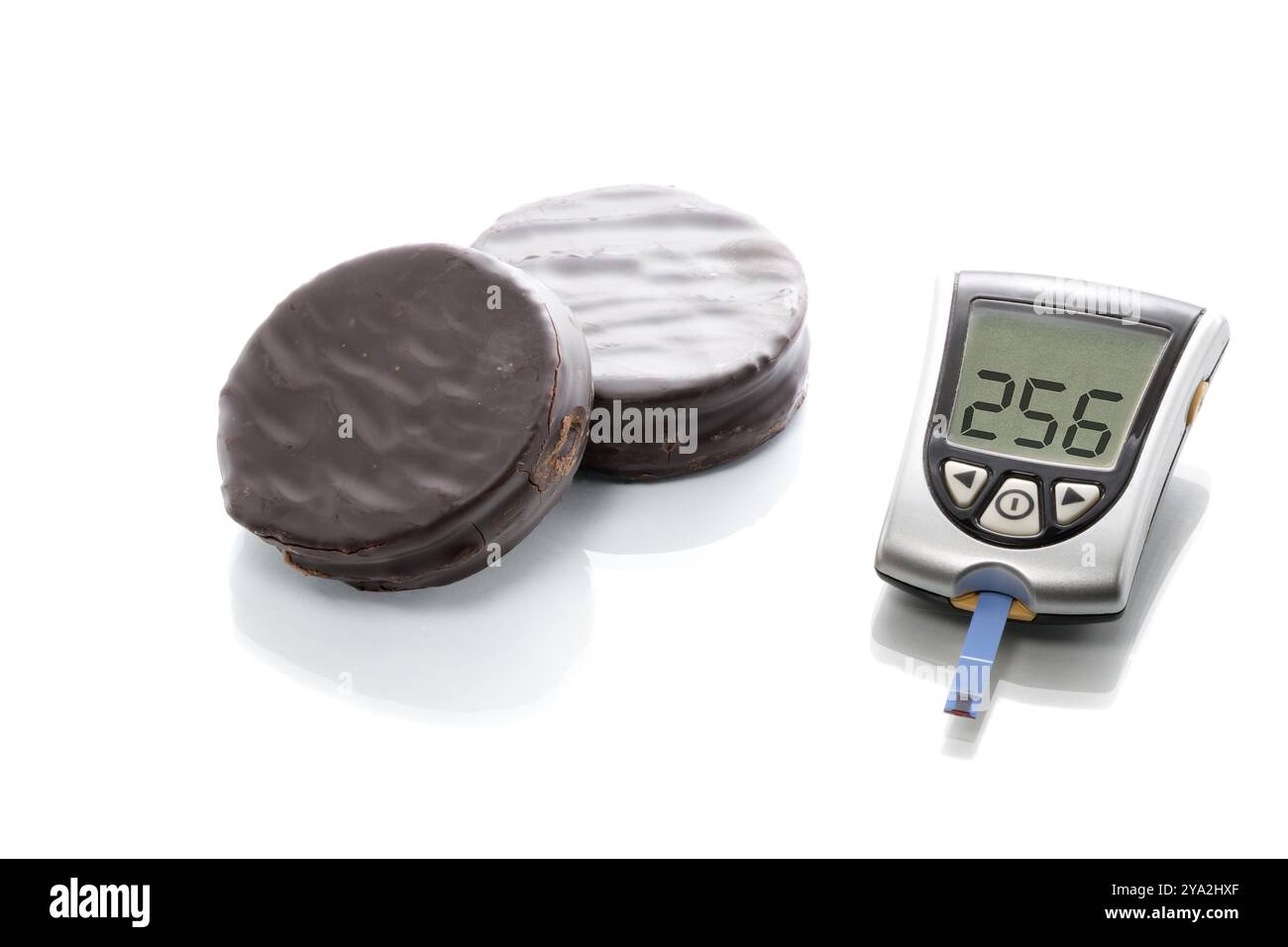 Measurement of the glucose concentration in the blood with a blood glucose meter Stock Photo