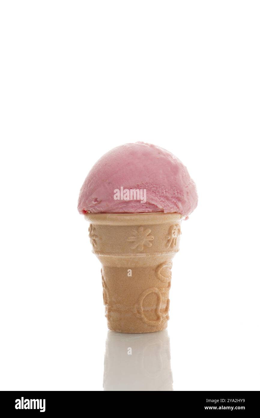 A scoop of strawberry ice cream in a cone Stock Photo - Alamy