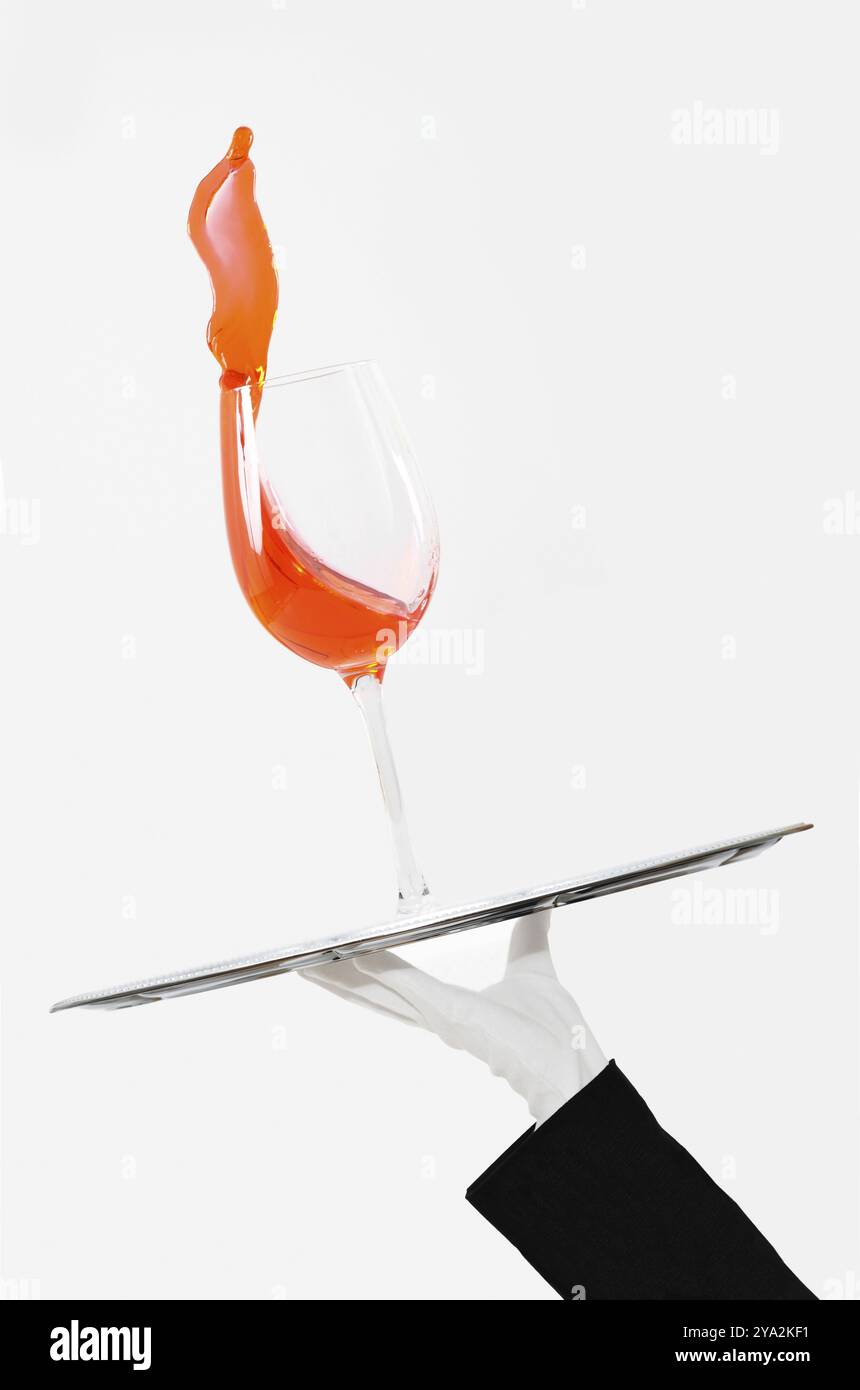 Waiter carrying silver tray hi-res stock photography and images - Alamy