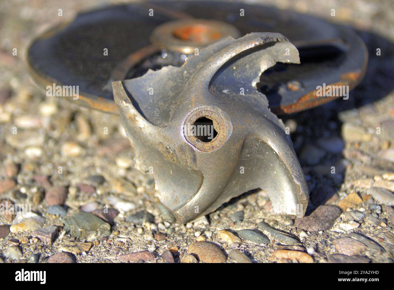 Impeller of a water pump. The impeller is heavily worn by stones Stock ...