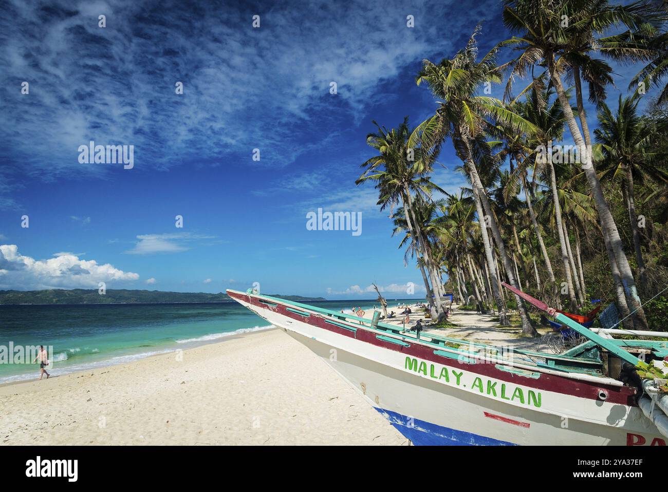 Traditional filipino fishing boat on puka beach in tropical paradise ...