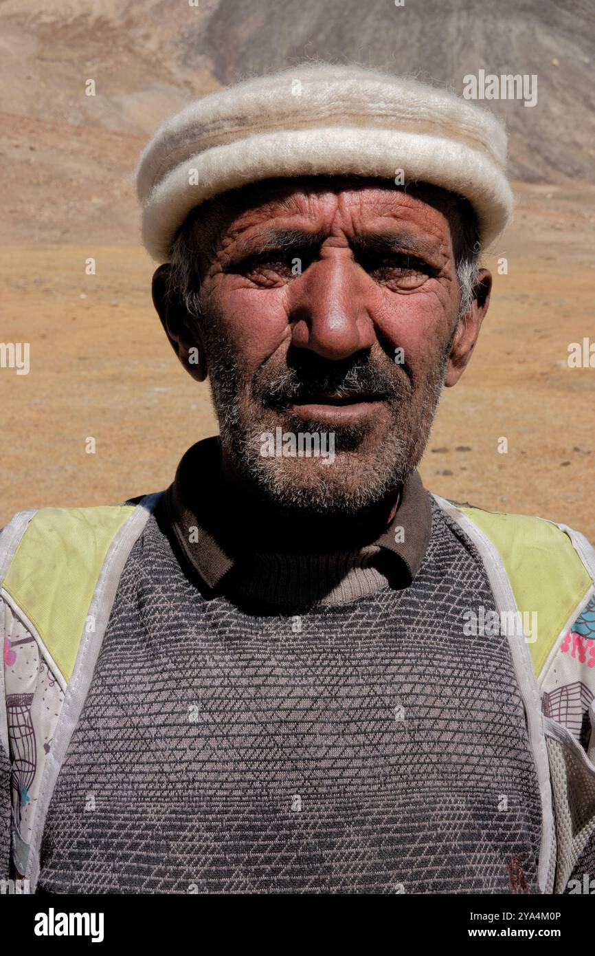 Portrait of an old Shimshali climber under Minglik Sar,  Shimshal, Gojal, Pakistan Stock Photo