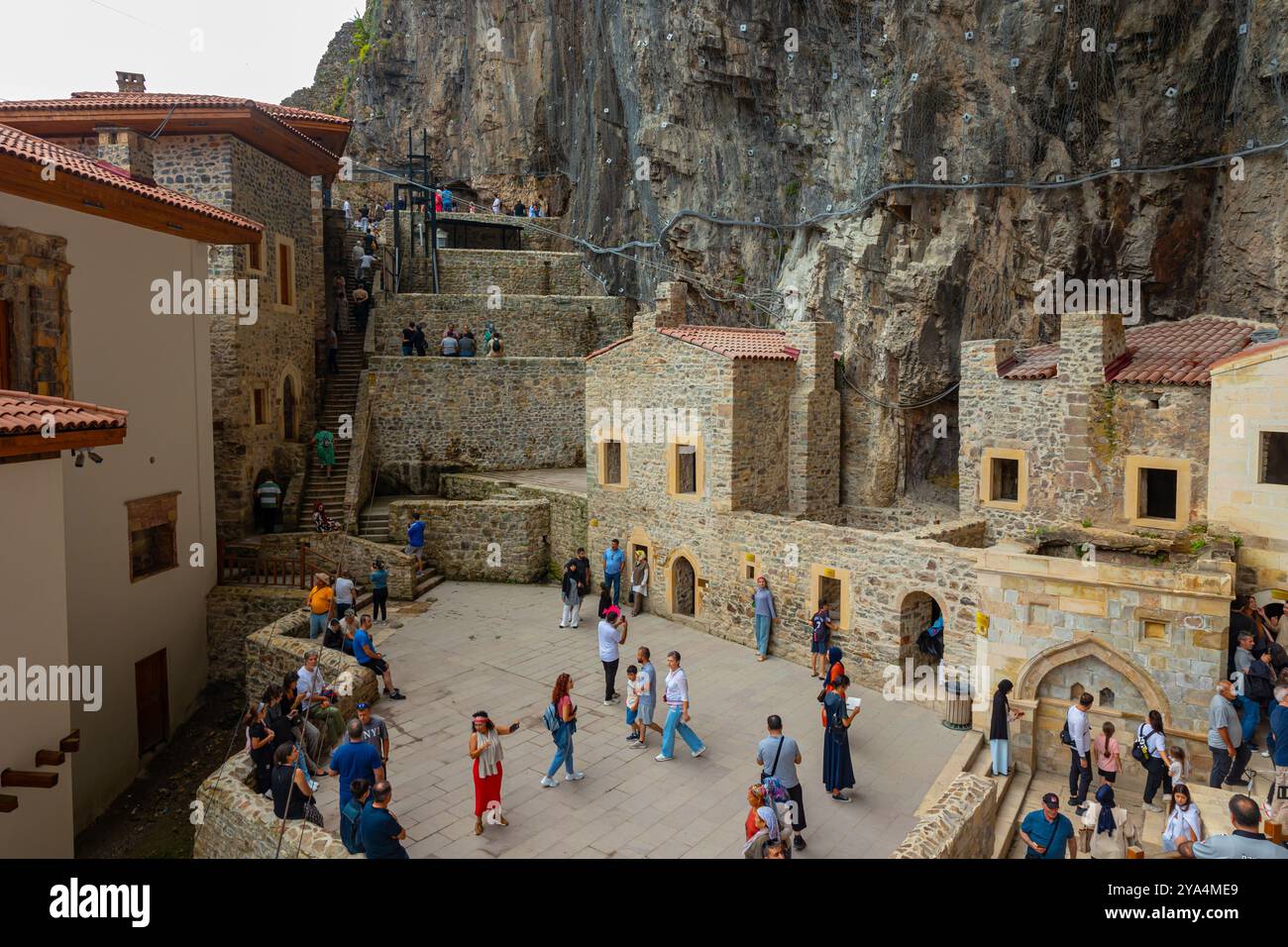 Visitors inside the Sumela Monastery. Visit Trabzon concept photo. Trabzon Turkey - 8.3.2024 Stock Photo