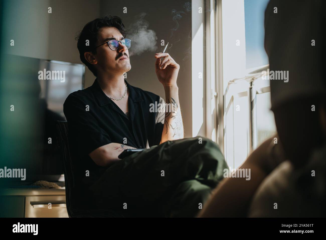 Smoking pose hi-res stock photography and images