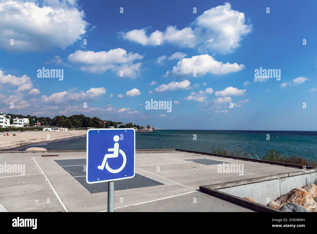 Empty parking lot for disabled people by the sea Stock Photo