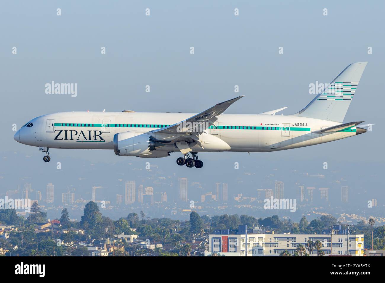 ZIPAIR Boeing 787 aircraft at an airport taxiway. Low-cost airline