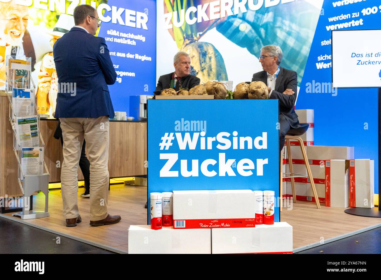 Augsburg, Bavaria, Germany - October 11, 2024: Südzucker exhibition stand at the CSU party conference.The stand advertises the benefits of beet sugar, including sustainable and regional production, with large banners *** Südzucker-Messestand beim CSU-Parteitag. Der Stand wirbt mit großflächigen Bannern über die Vorteile von Rübenzucker, darunter nachhaltige und regionale Produktion Stock Photo