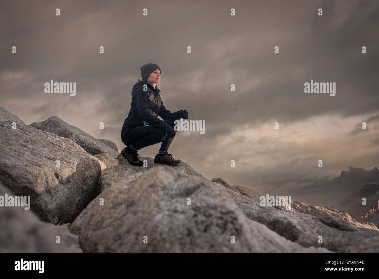 Woman walking on rocky viewpoint hi-res stock photography and images ...