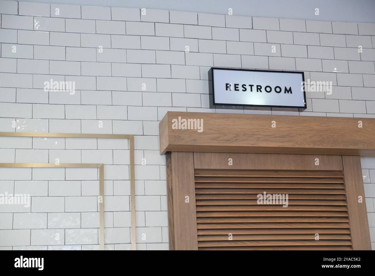 Contemporary Restroom Signage Featuring a Stylish and Sophisticated ...