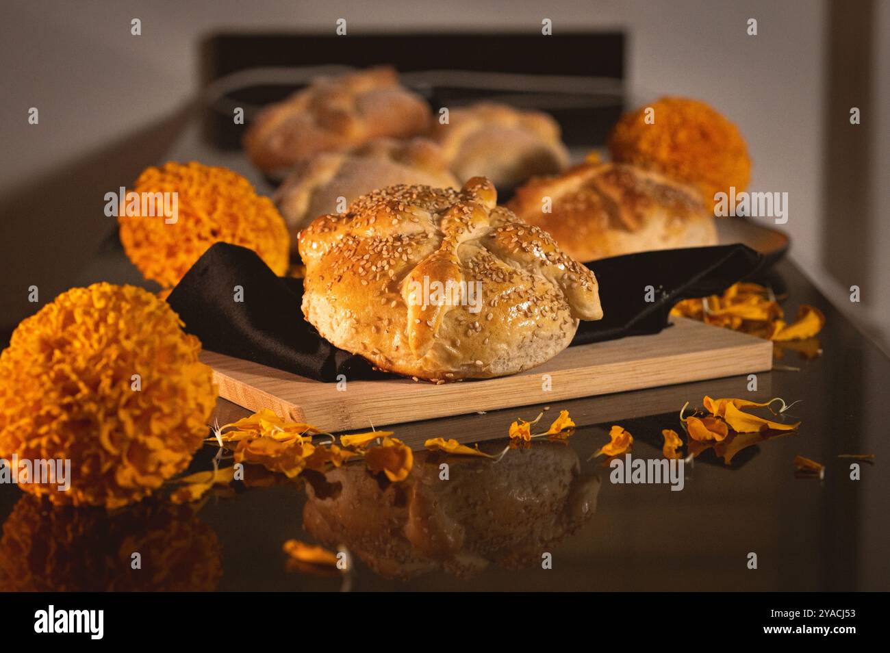 Pan de Muerto. Typical Mexican sweet bread that is consumed in the season of the day of the dead. It is a main element in the altars and offerings in Stock Photo