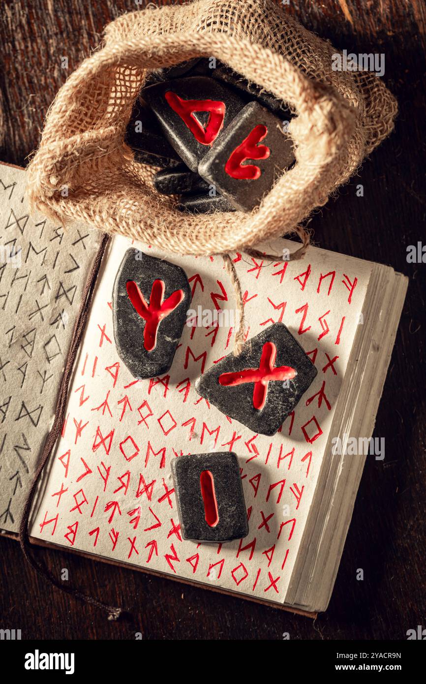 Closeup of vintage runic divination by stones based on ancient language ...
