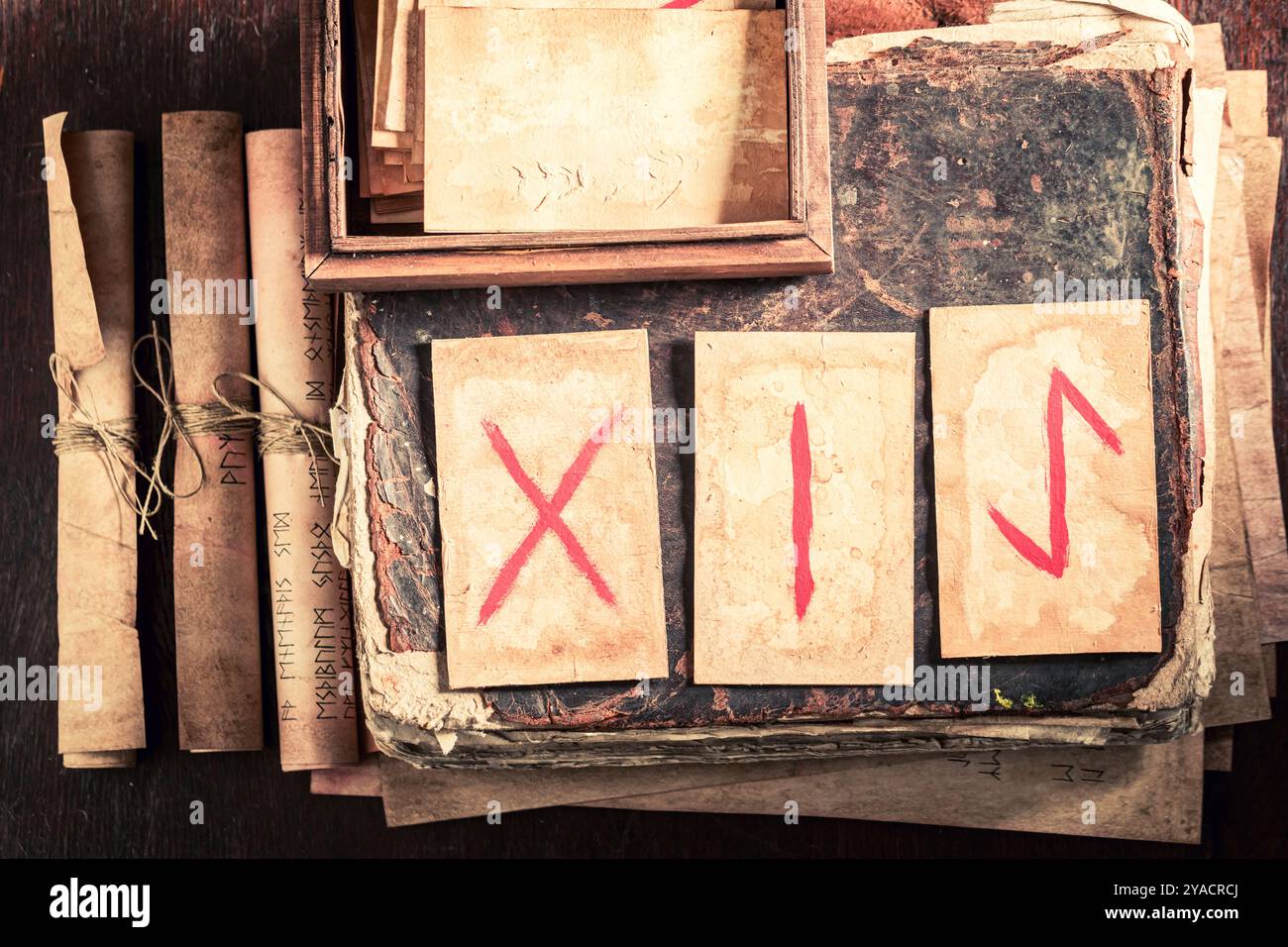 Fortune teller from futhark rune cards on wooden table as a mystical ...