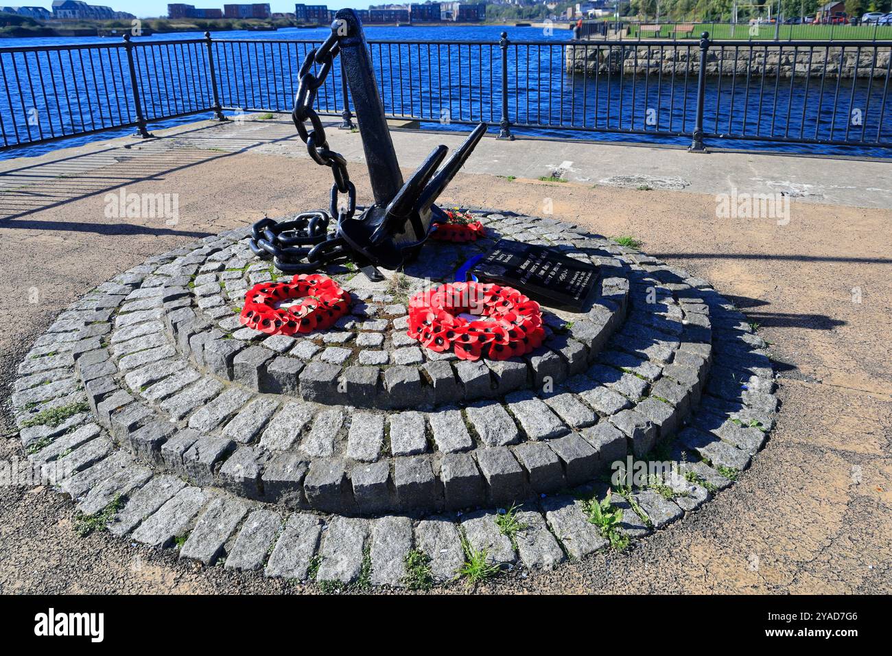 Memorial to Seamen Lost at Sea with poppy wreaths, Old Barry Dock area, Barry, South Wales, UK. Taken October 2024 Stock Photo