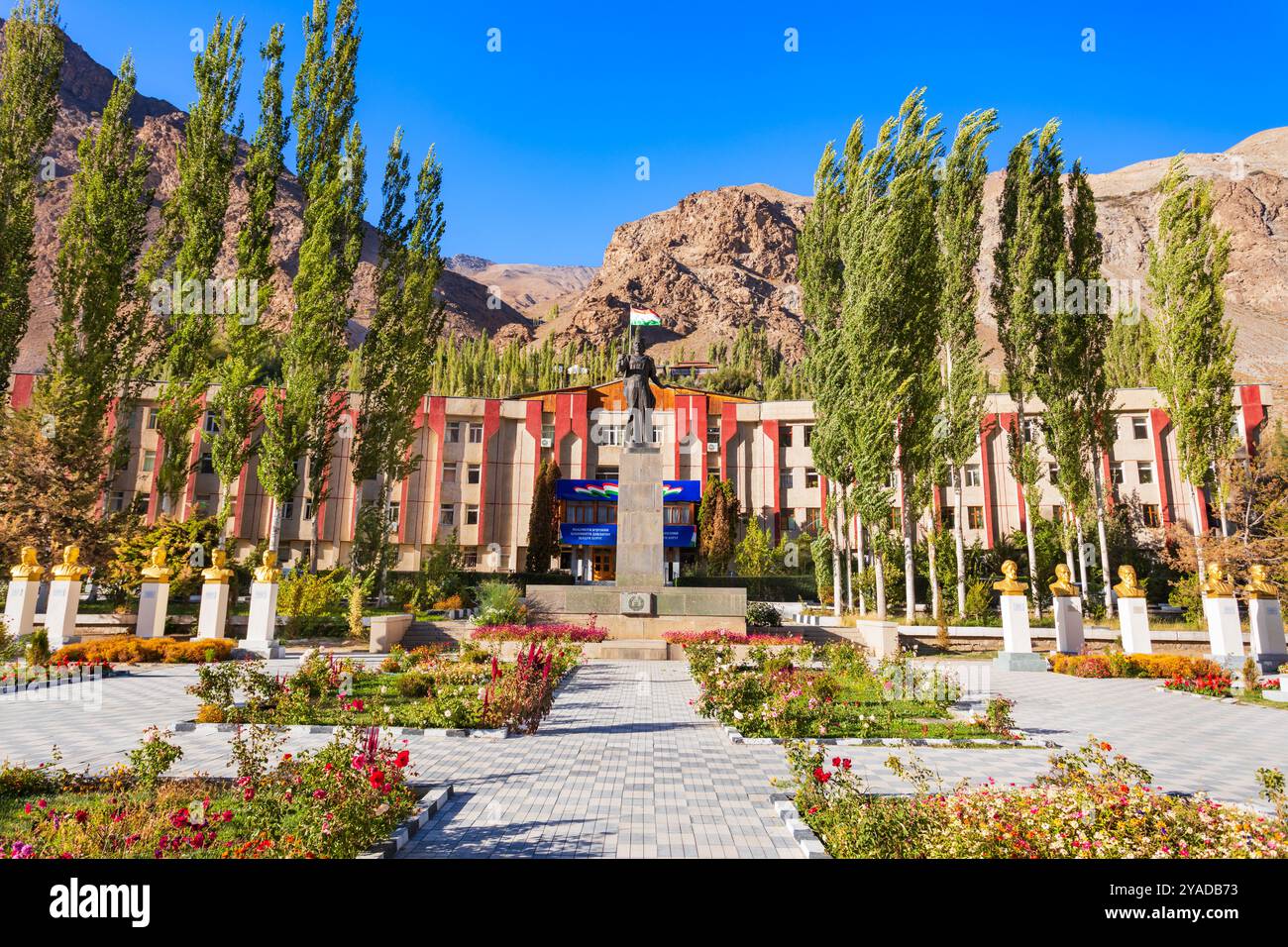 Khorog, Tajikistan - October 04, 2022: GBAO Gorno-Badakhshan Autonomous Region Government Building and Ismail Samoni statue in Khorog city, Tajikistan Stock Photo