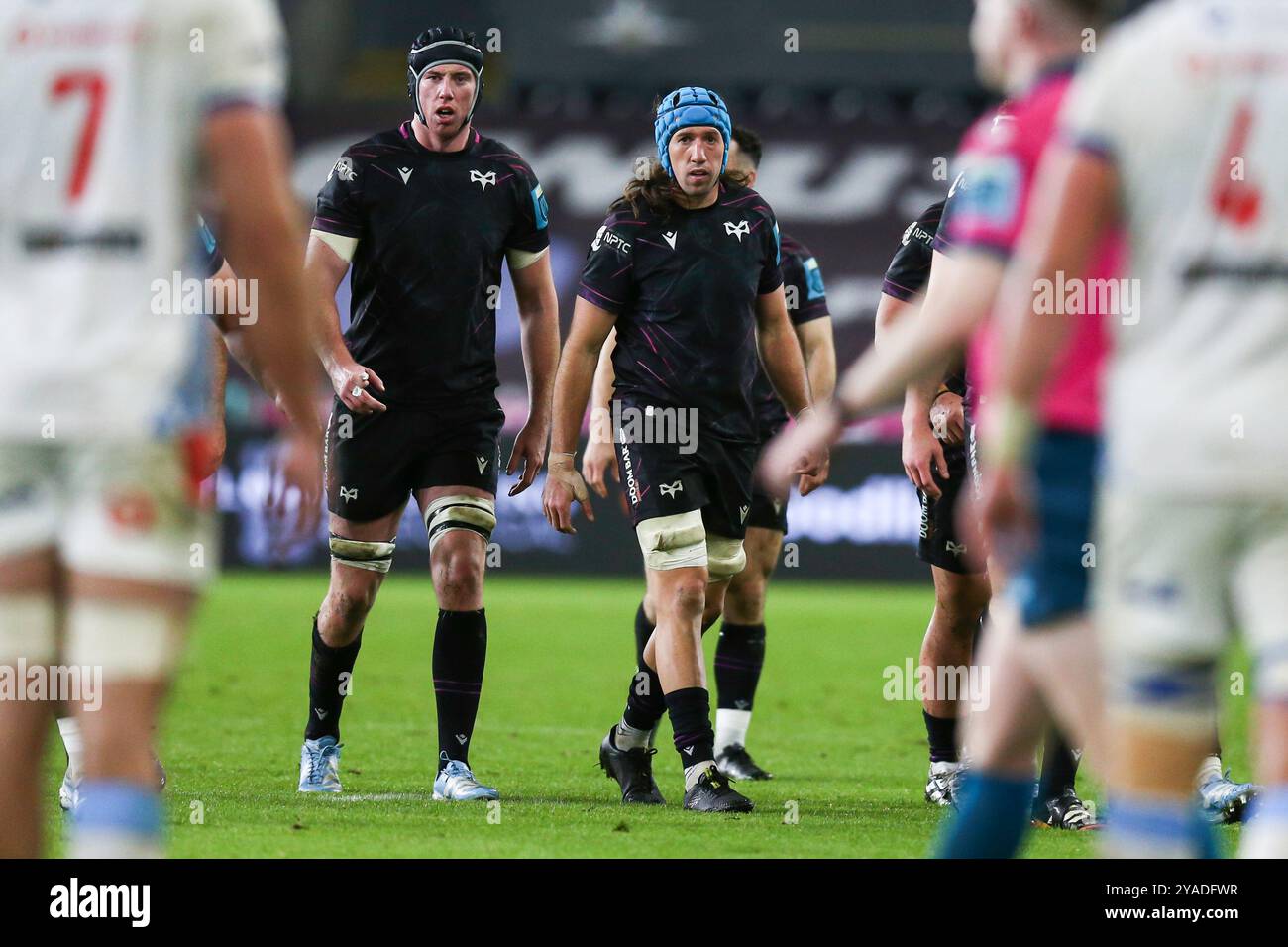 Swansea, UK. 12 October, 2024. Adam Beard and Jac Morgan of Ospreys during the Ospreys v Bulls URC Rugby Match. Credit: Gruffydd Thomas/Alamy Stock Photo