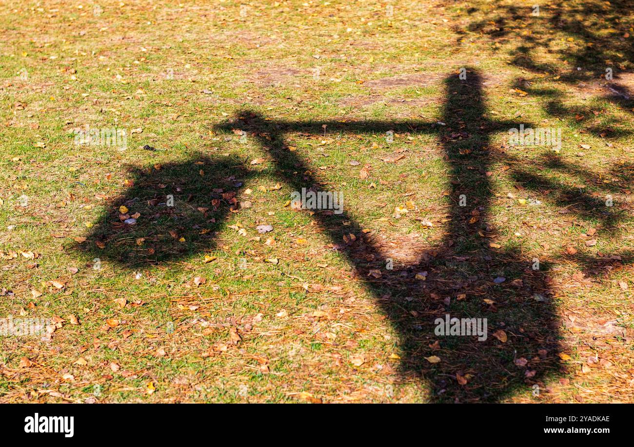 Concept shot of the decorative lamp post casting shadow Stock Photo