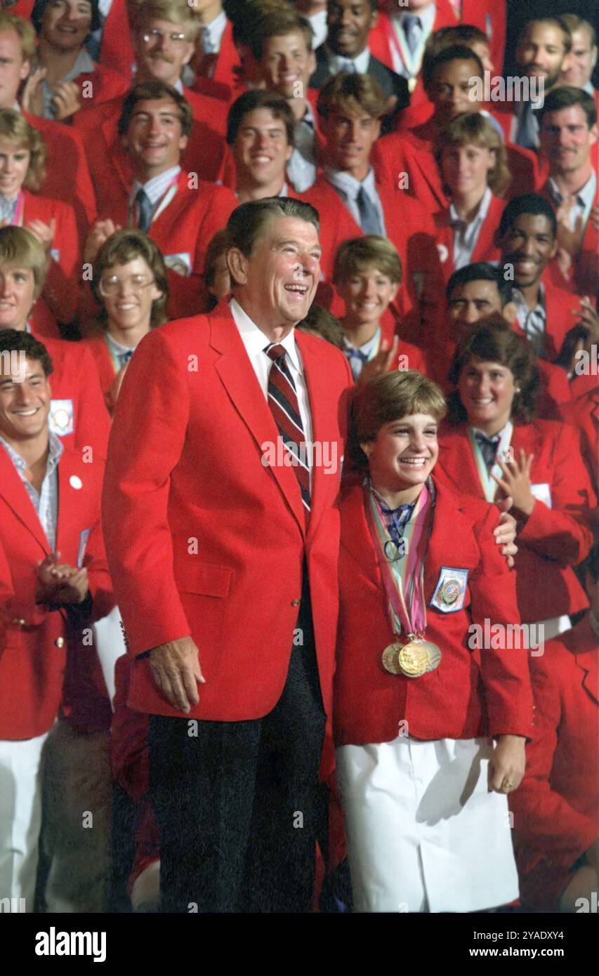 Mary Lou Retton. Portrait of the former Olympic gold medal winning gymnast, Mary Lou Retton (b. 1968) with President Ronald Reagan at the Los Angeles Olympic Games in 1984 Stock Photo