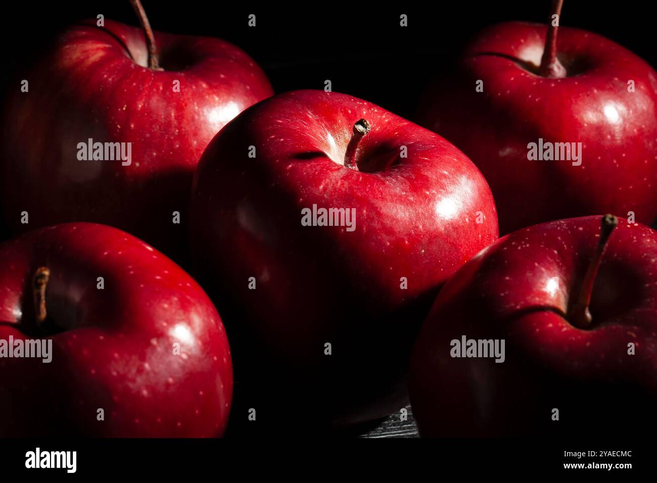 red delicious apples on black background Stock Photo