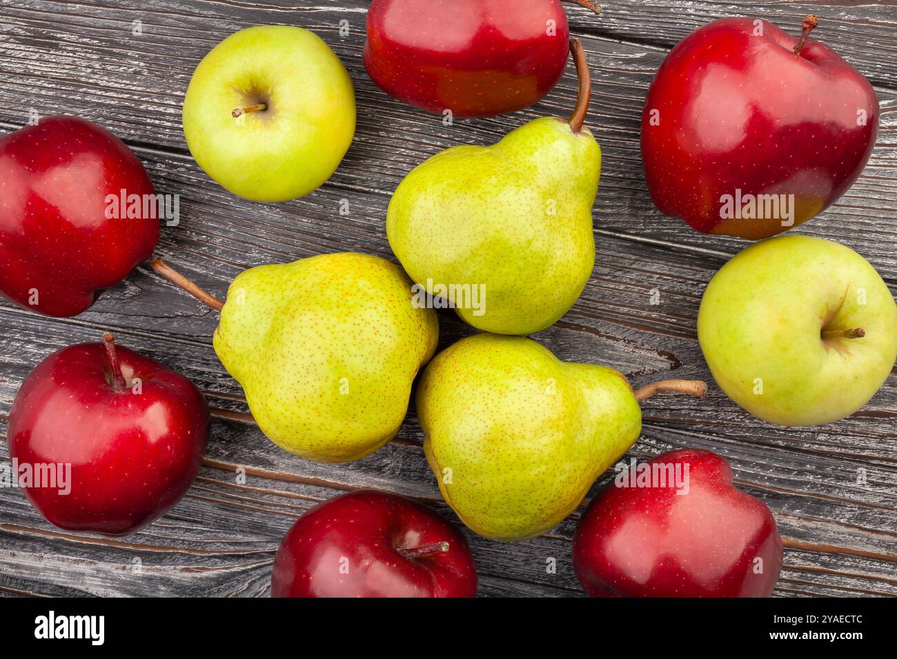 pears apples on wood background top view Stock Photo