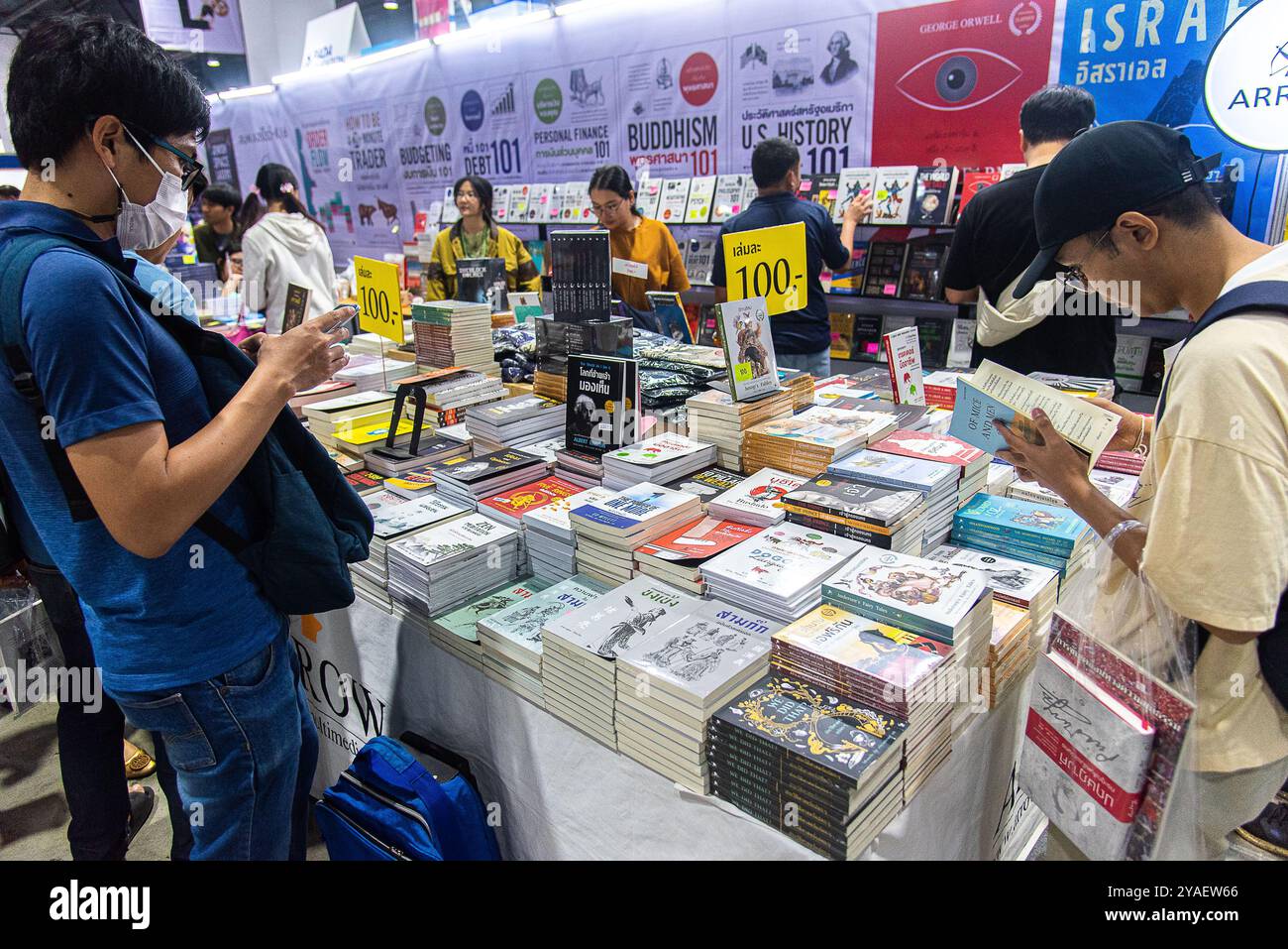 Visitors check books on display during the Book Expo Thailand 2024 at
