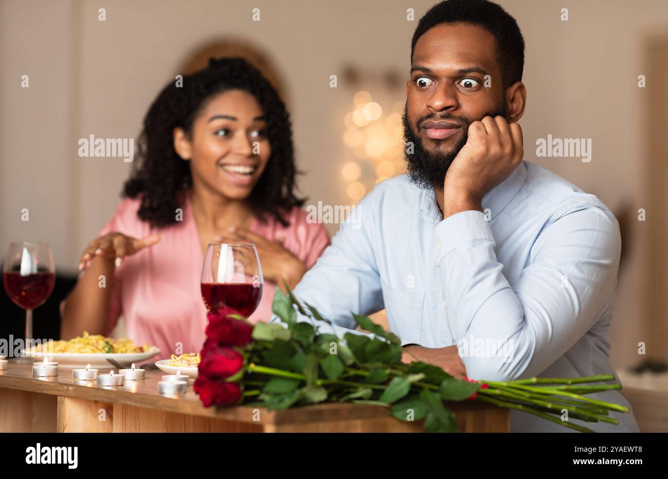 Black Couple On Unsuccessful Blind Date In Restaurant Stock Photo