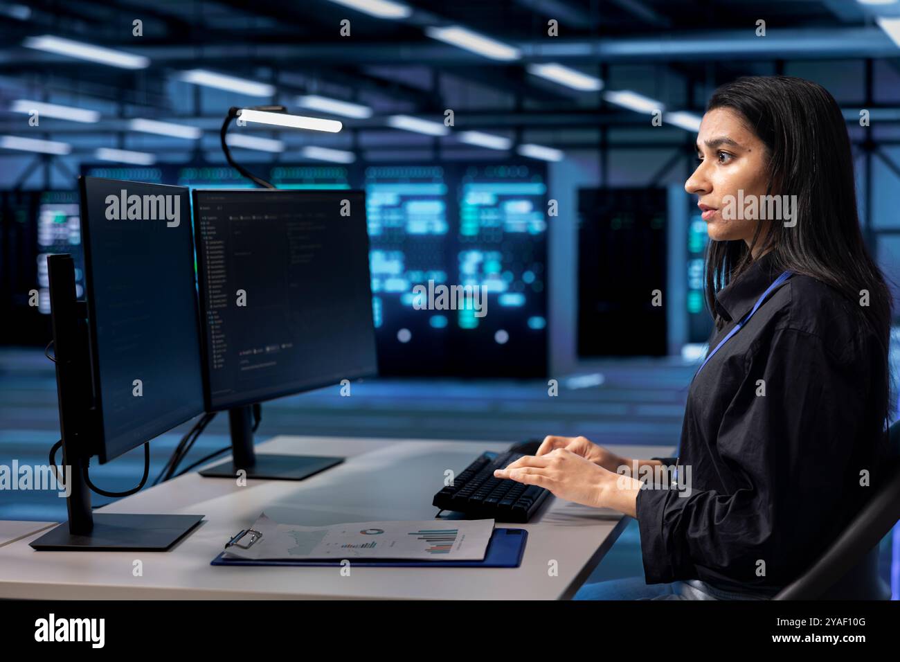 Software Development Server Developer in server hub checking hi-res stock photography and images ...