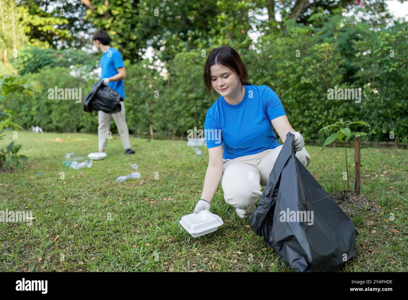 Community Volunteers Cleaning Up Park Litter and Promoting ...