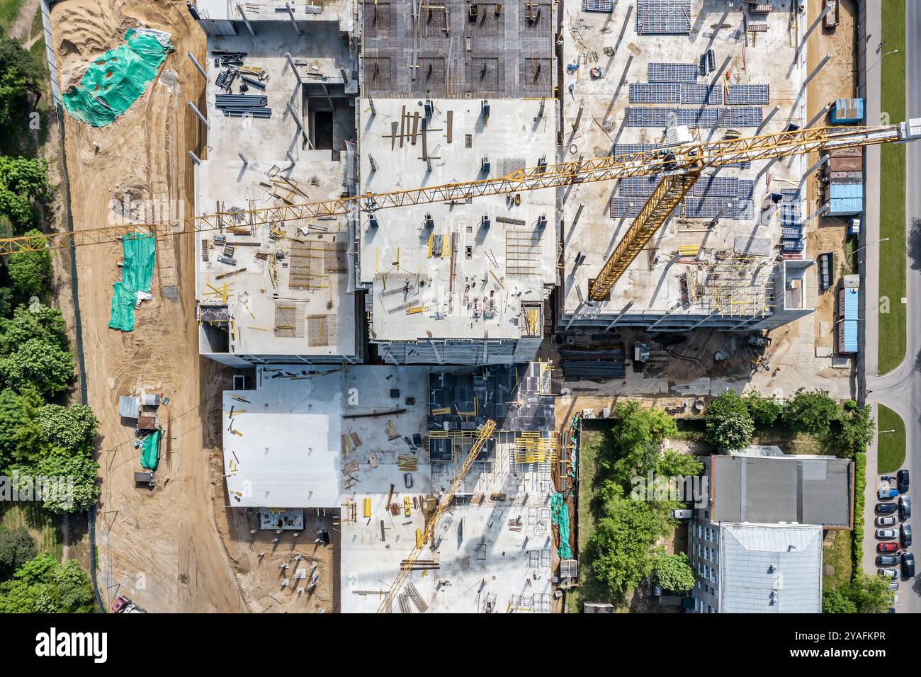 aerial top view of city construction site with unfinished concrete ...