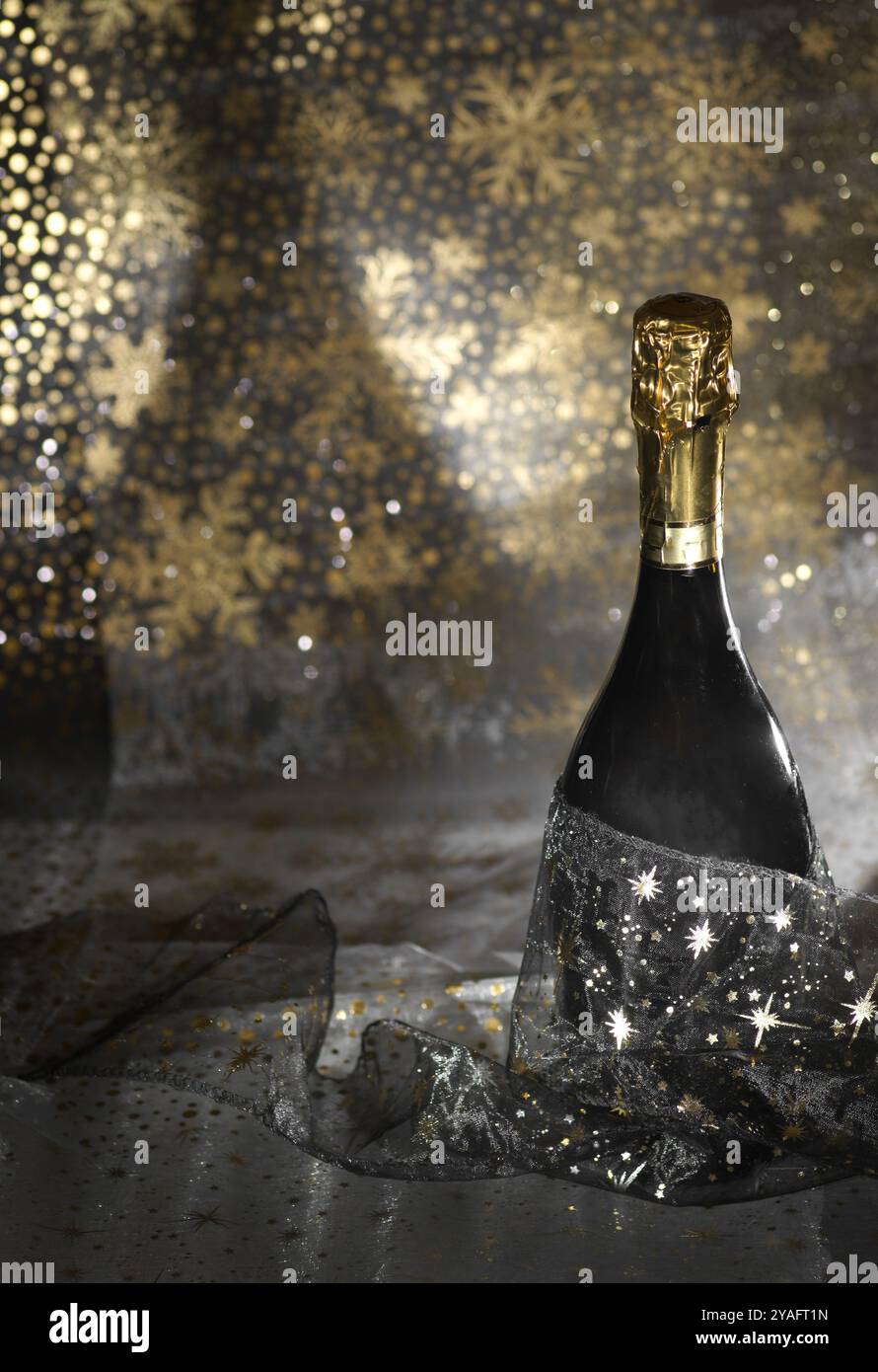 New Year concept, with bright light and champagne bottle, abstract bokeh background Stock Photo