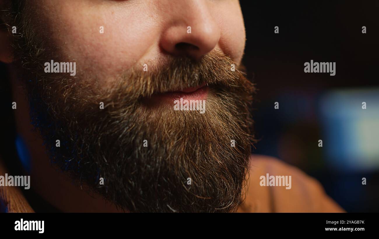 Happy computer scientist feeling satisfied after removing all bugs while coding on workstation desktop. Teleworking upbeat IT specialist pleased after solving script errors, camera A extreme close up Stock Photo