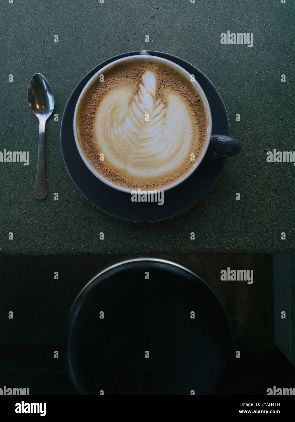Overhead looking down view of cafe latte on counter Stock Photo - Alamy