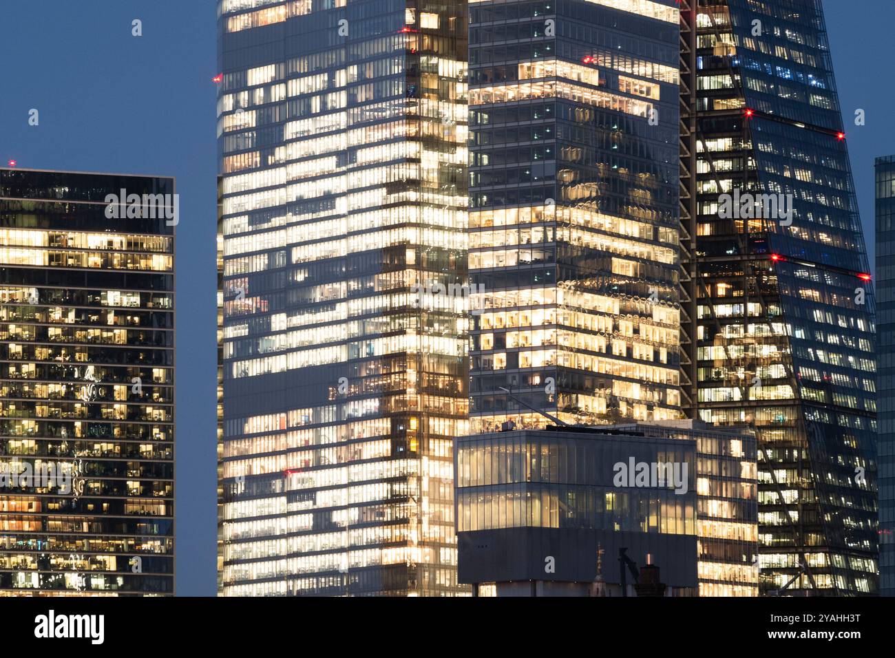 Abstract of illuminated office windows in London financial district Stock Photo