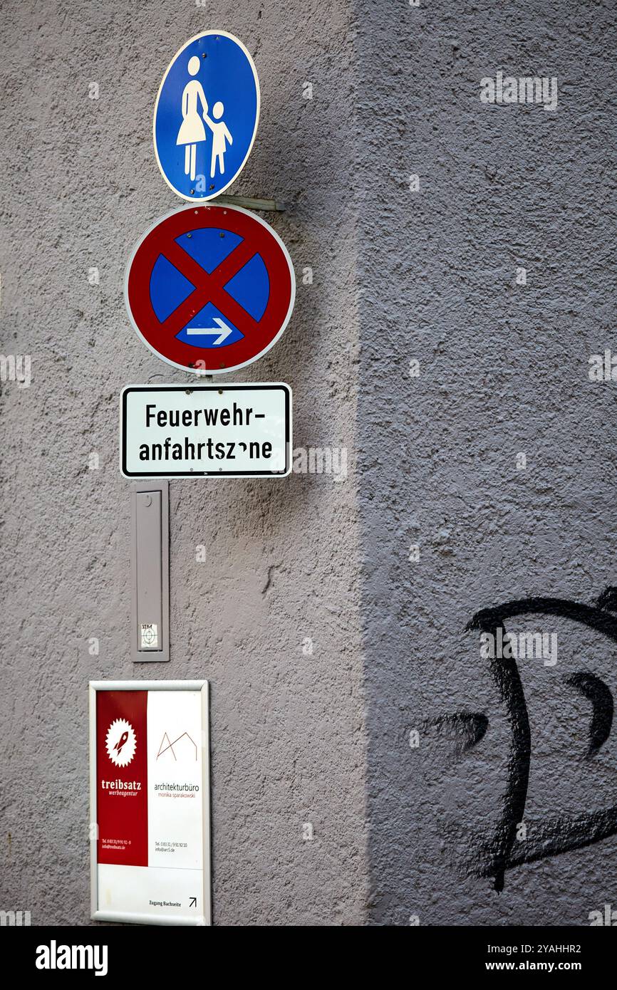 Scene Signage Street scene, signage and architecture in Memmingen, Germany ...