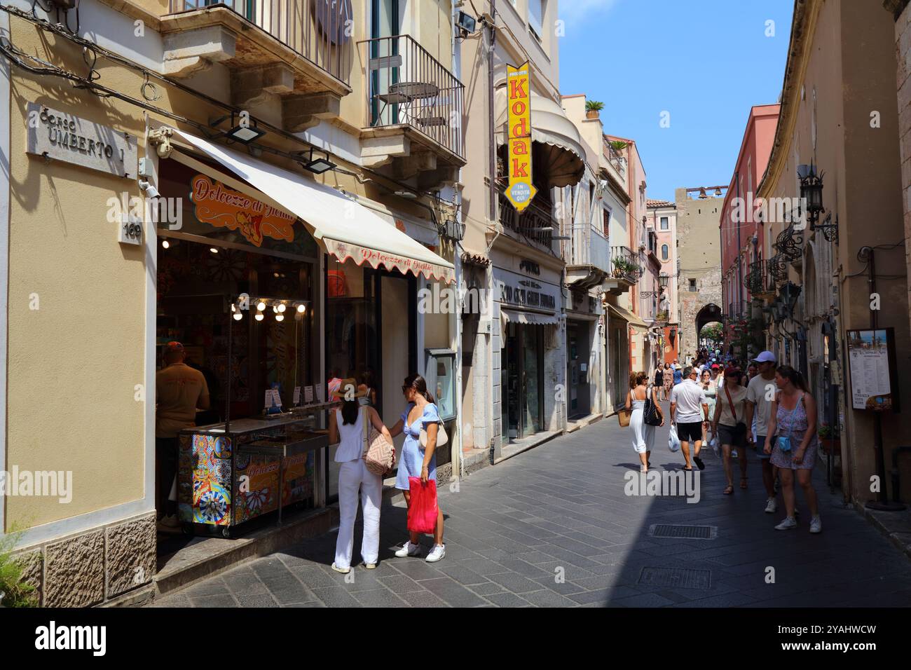 TAORMINA, ITALY - AUGUST 4, 2024: People walk the Corso Umberto I ...