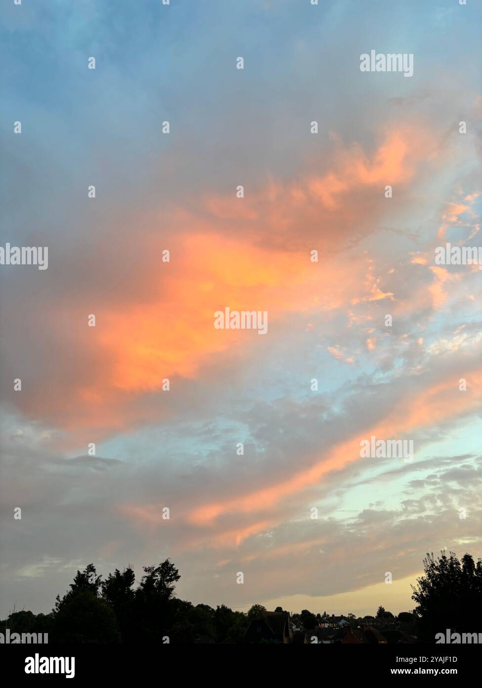 kent sky - orange autumn light on clouds - Smartphone Captured Stock Image