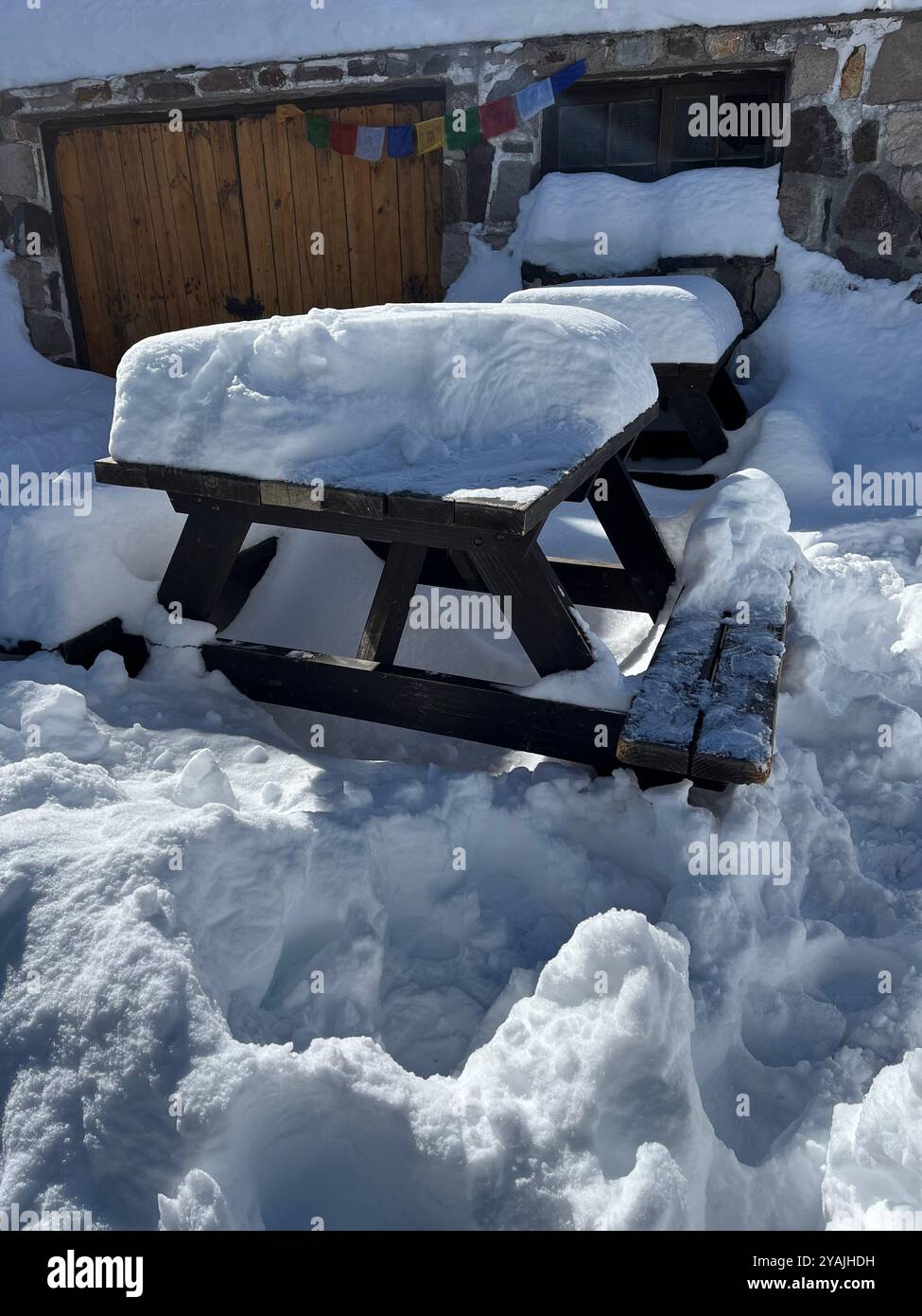 Picture of a snowy picnic table at Santiago, Chile. - Smartphone Captured Stock Image