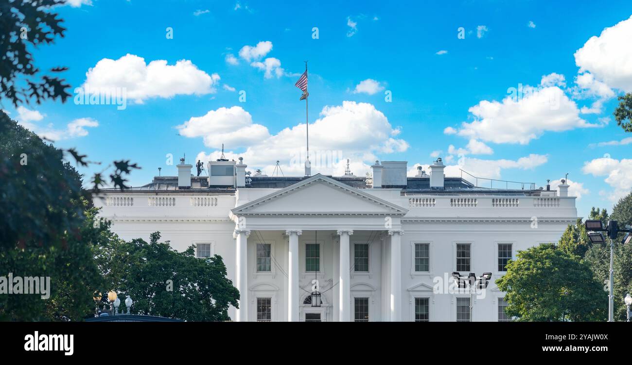 The White House under a blue sky with clouds. Washington D.C., USA ...