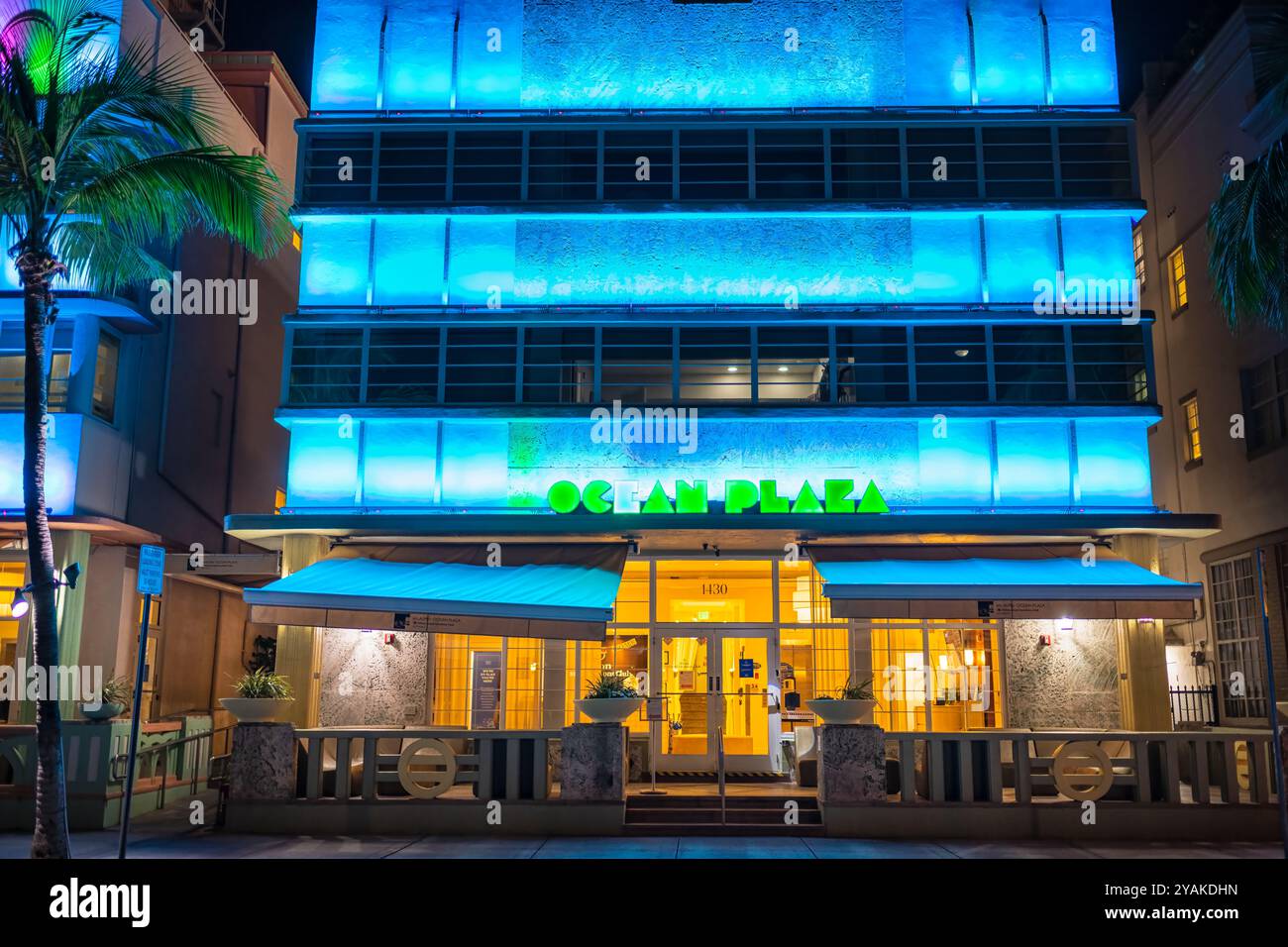 Miami Beach, USA - January 20, 2021: McAlpin Ocean plaza Hilton hotel at art deco district night with neon sign on Ocean drive in South Beach, Florida Stock Photo