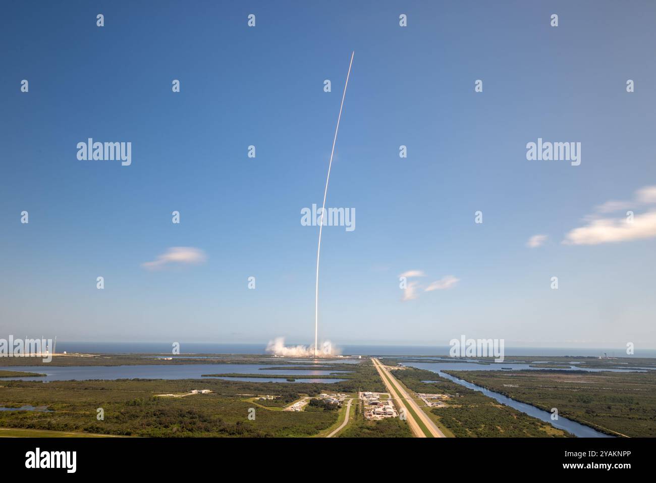 Cape Canaveral, United States of America. 14 October, 2024. A SpaceX Falcon Heavy rocket carrying the NASA Europa Clipper unmanned spacecraft streaks into the sky as it blasts off from Launch Complex 39A at Kennedy Space Center, October 14, 2024 in Cape Canaveral, Florida. The spacecraft will explore the ice-covered Europa orbiting Jupiter in a search for life. Credit: Frank Michaux/NASA Photo/Alamy Live News Stock Photo