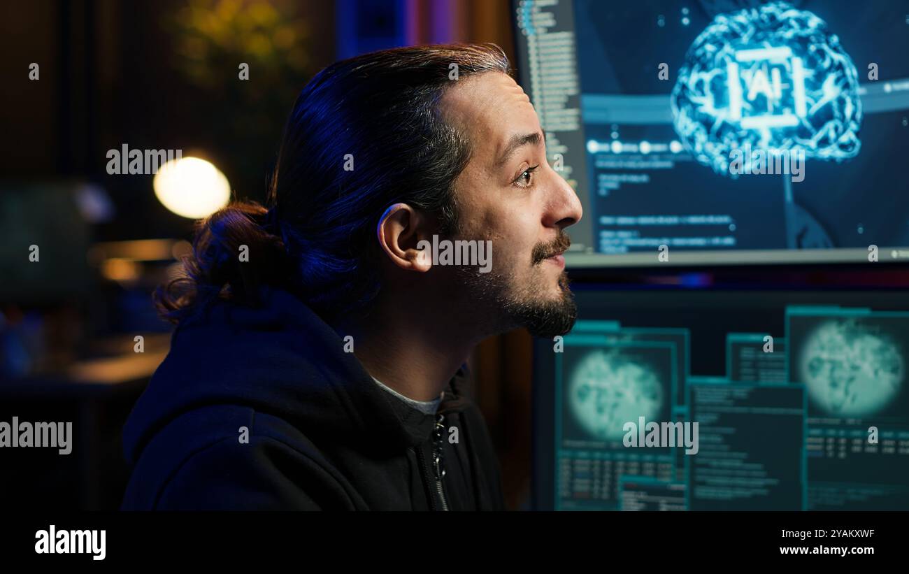 Hacker using AI machine learning on computer to produce malware corrupting data. Scammer working on PC using artificial intelligence tech, infecting systems, close up shot, camera A Stock Photo