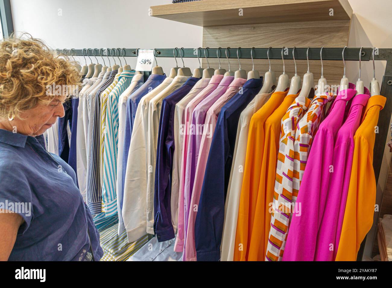 Trieste Italy,Piazza della Borsa,And Camicie,inside interior,clothing store shirts blouses,men's women's,rack display sale shopping,Italian Europe Eur Stock Photo