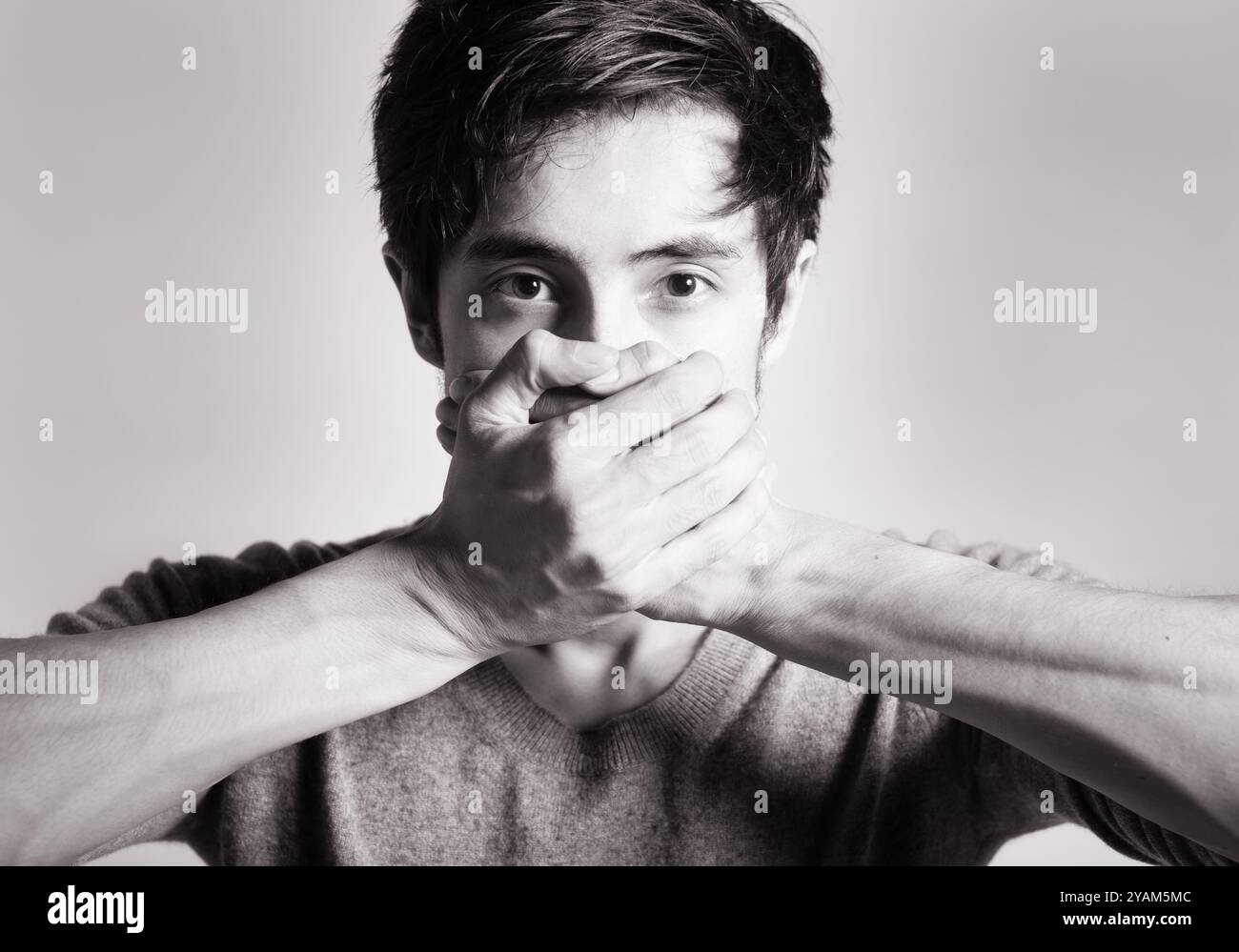 Man covering his mouth keeping a secret concept, silence concept Stock ...