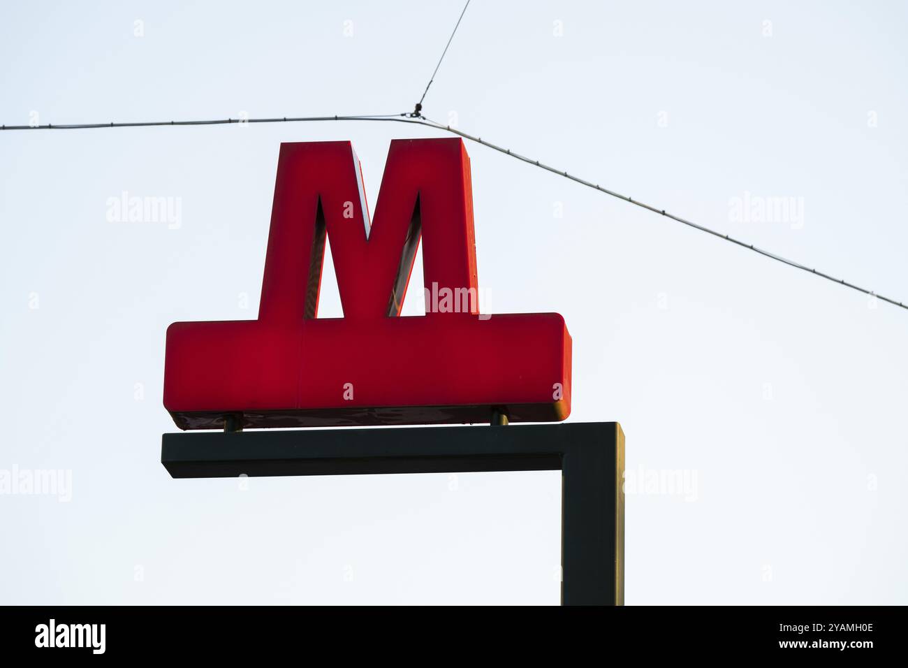 Red M symbol on a sign for underground or metro, Norreport, Copenhagen ...