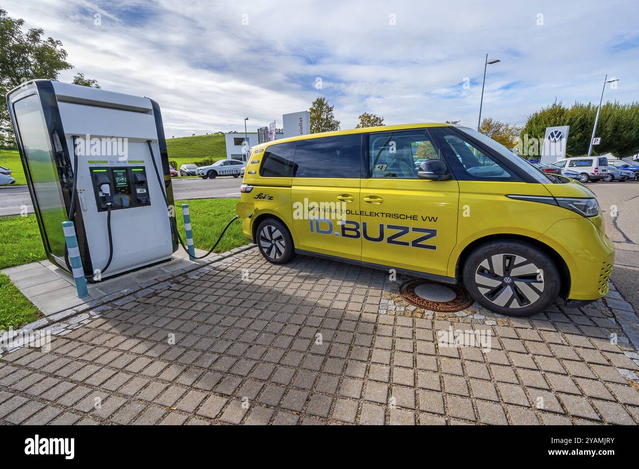 The new all-electric Volkswagen ID-BUZZ with charging station, Kempten, Allgaeu, Bavaria, Germany, Europe Stock Photo