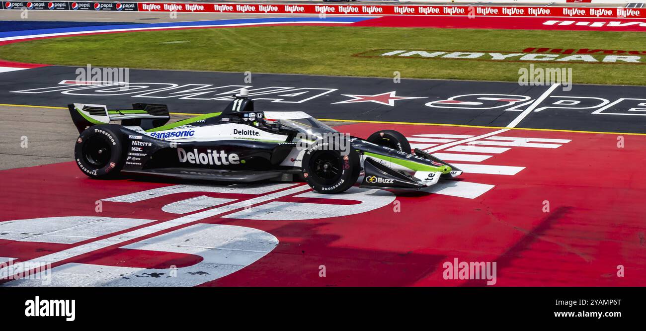 INDYCAR Driver, Takuma Sato (11) of Tokyo, Japan, crosses the finish ...